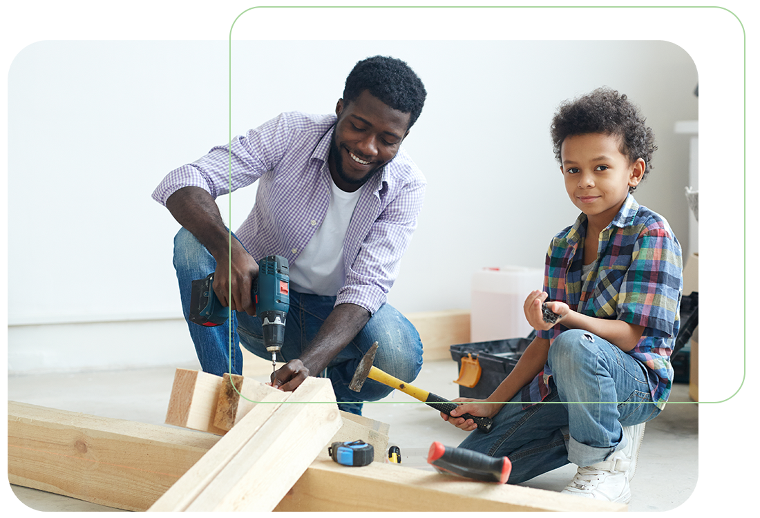 father and son doing home project together